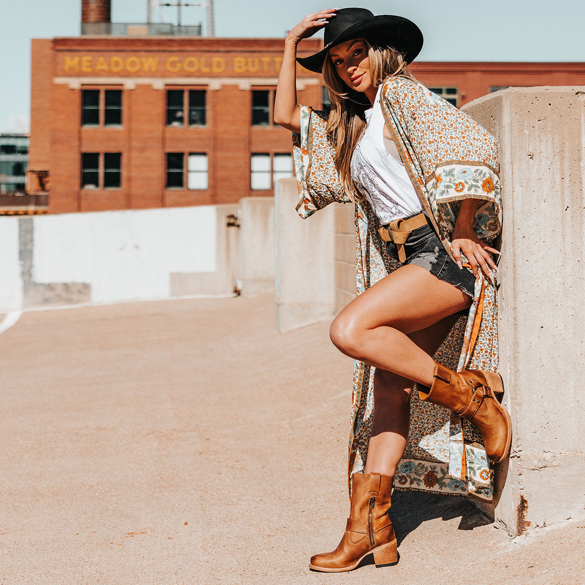 FREEBIRD women's Darcy wheat leather boot with a studded ankle harness, leather pull straps, an inside zip closure and a square toe lifestyle