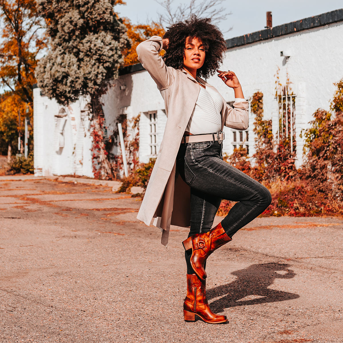 FREEBIRD women's Darcy whiskey leather boot with a studded ankle harness, leather pull straps, an inside zip closure and a square toe lifestyle
