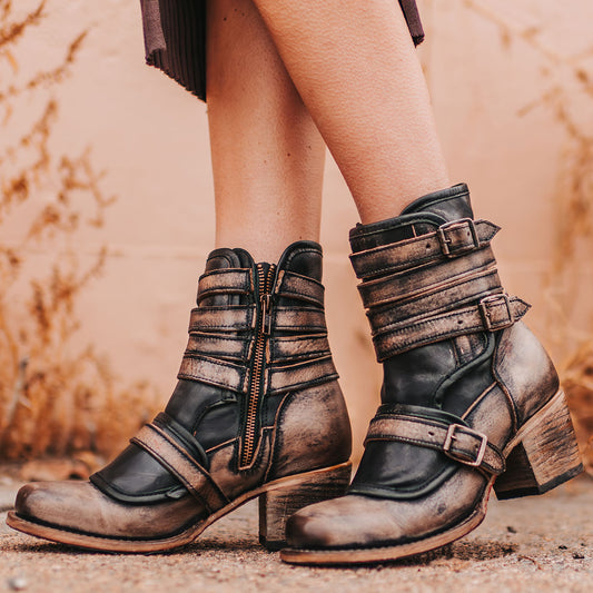 FREEBIRD women's Darlin black leather bootie with leather straps, inside zip closure and square toe