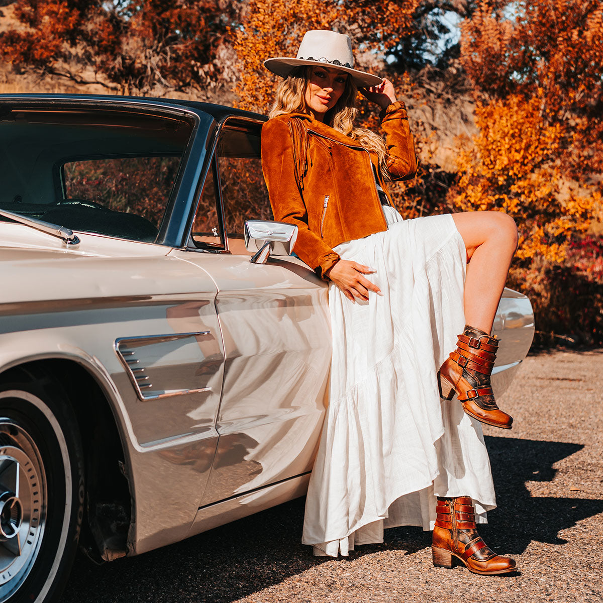 FREEBIRD women's Darlin cognac leather bootie with leather straps, inside zip closure and square toe lifestyle