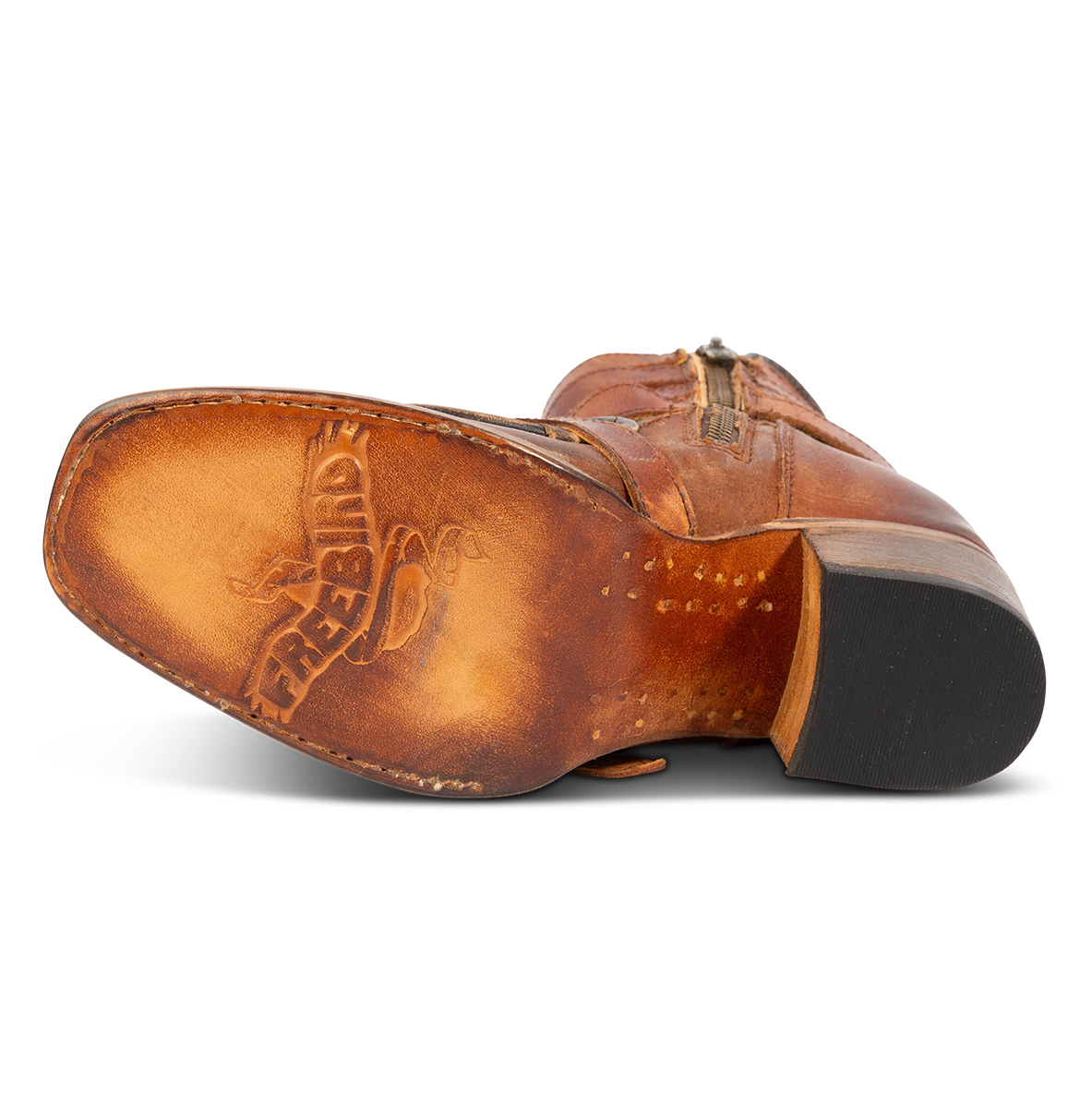 Leather sole imprinted with FREEBIRD on women's Darlin cognac leather bootie