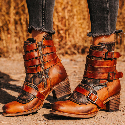 FREEBIRD women's Darlin cognac leather bootie with leather straps, inside zip closure and square toe