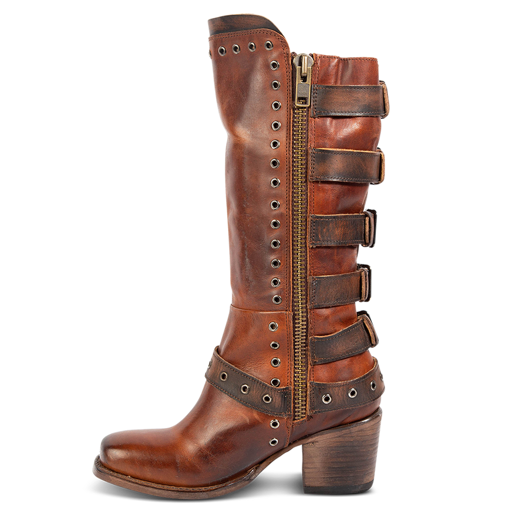 Side view showing FREEBIRD women's Derby cognac leather boot with shaft buckle straps, eyelet studs and square toe construction