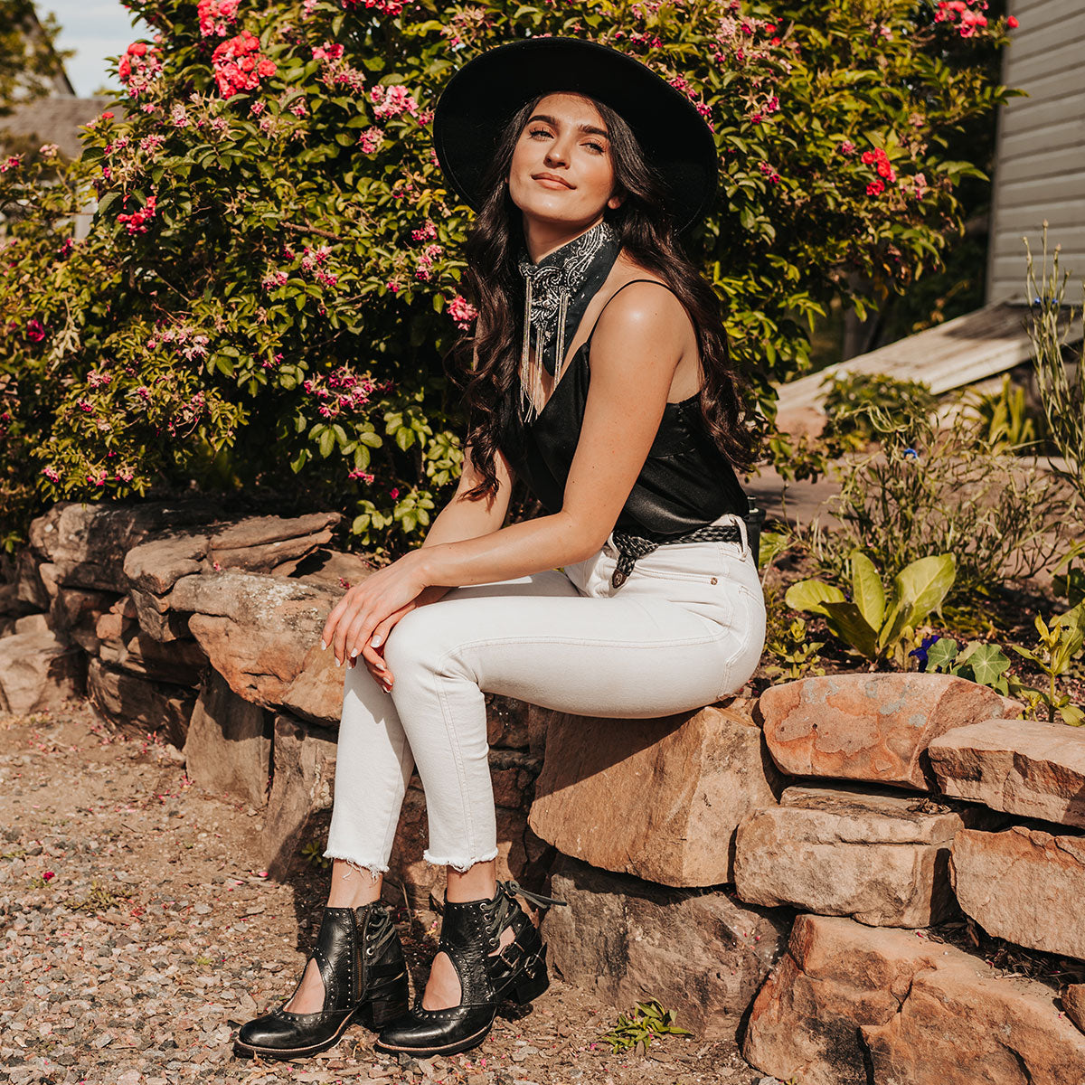 FREEBIRD Desert black bootie with leather straps and working buckles lifestyle image