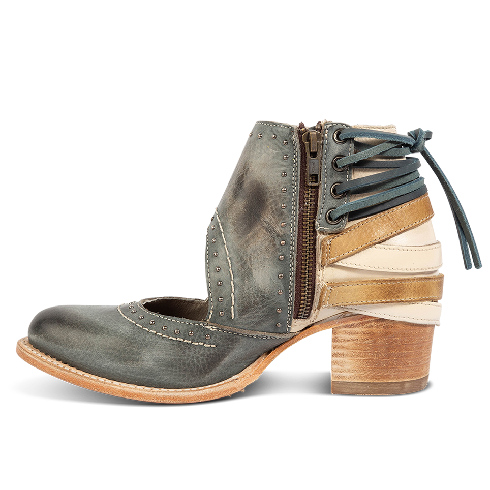 Inside view showing leather lace detailing and working brass zip closure on FREEBIRD women's Desert blue bootie