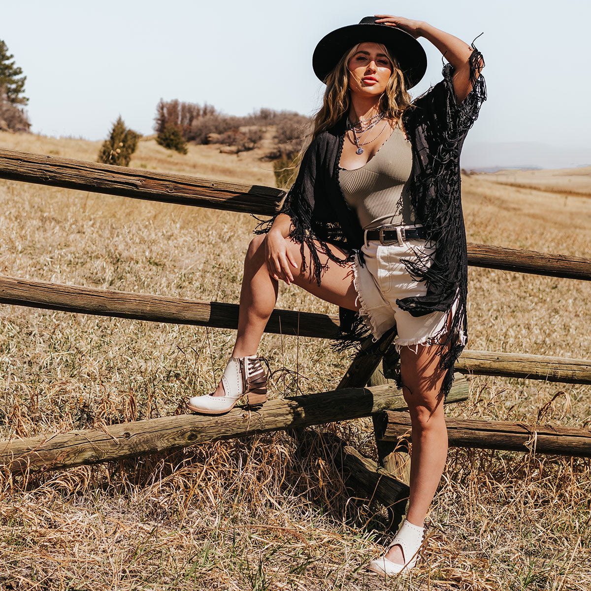 FREEBIRD Desert white multi bootie with leather straps and working buckles lifestyle image