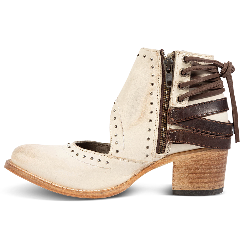 Inside view showing leather lace detailing and working brass zip closure on FREEBIRD women's Desert white multi bootie