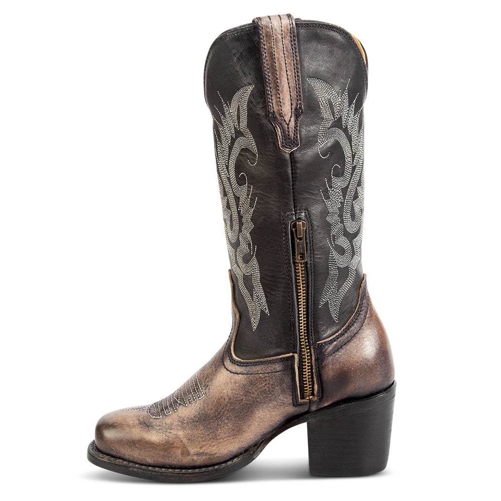 Inside view showing working brass zip closure, stacked heel, and stitch detailing on FREEBIRD women's Dice black leather boot