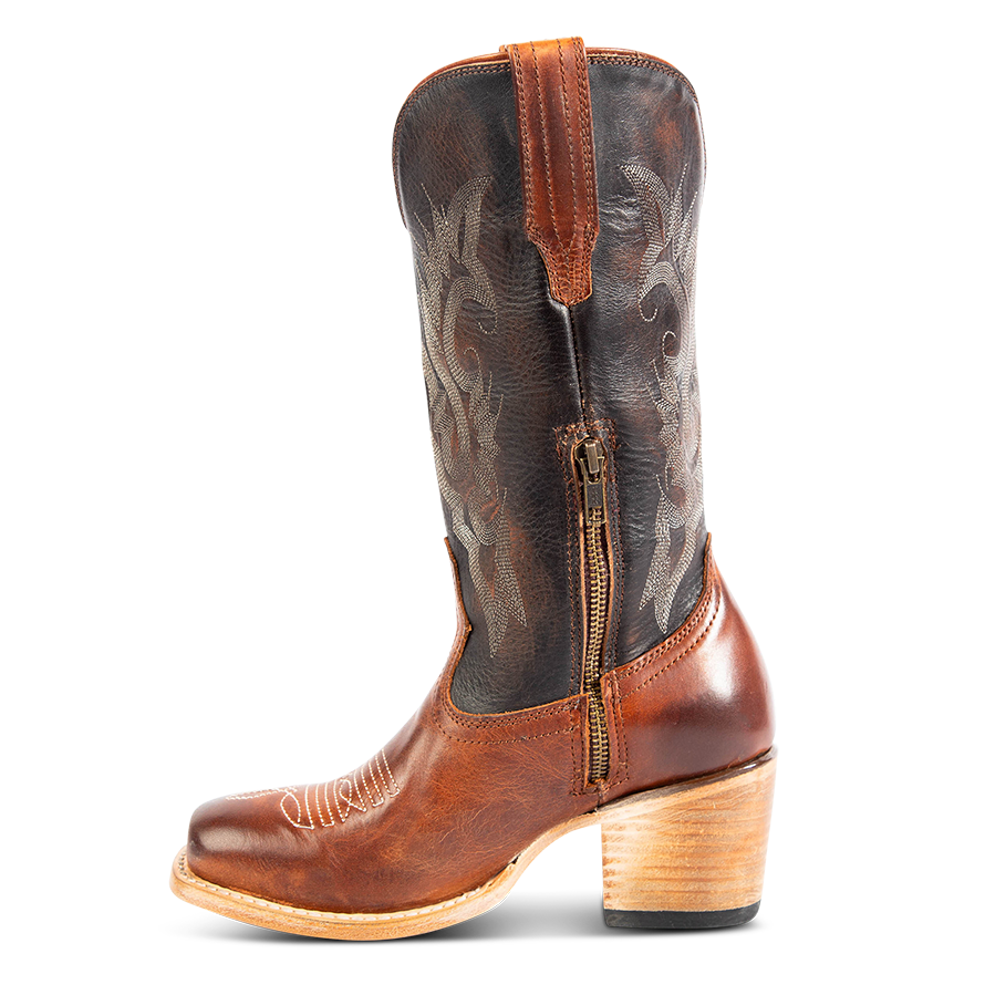 Inside view showing working brass zip closure, stacked heel, and stitch detailing on FREEBIRD women's Dice cognac leather boot