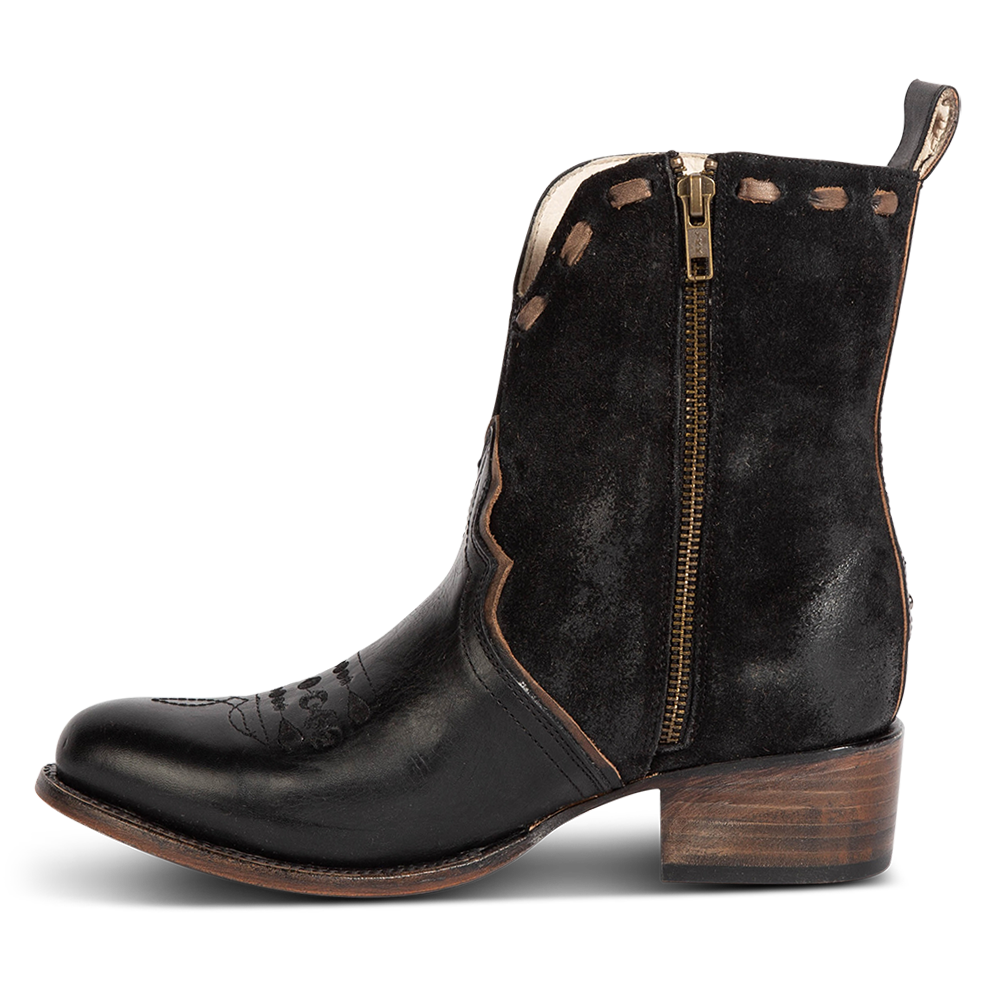 Inside view showing working brass zip closure on FREEBIRD women's Dolly black multi low heeled bootie