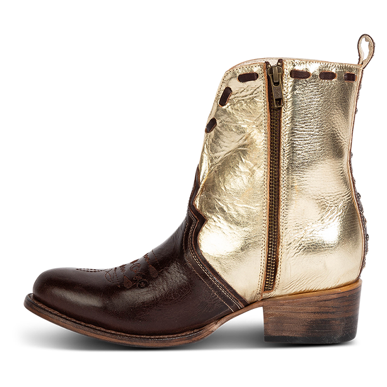 Inside view showing working brass zip closure on FREEBIRD women's Dolly gold/brown multi low heeled bootie
