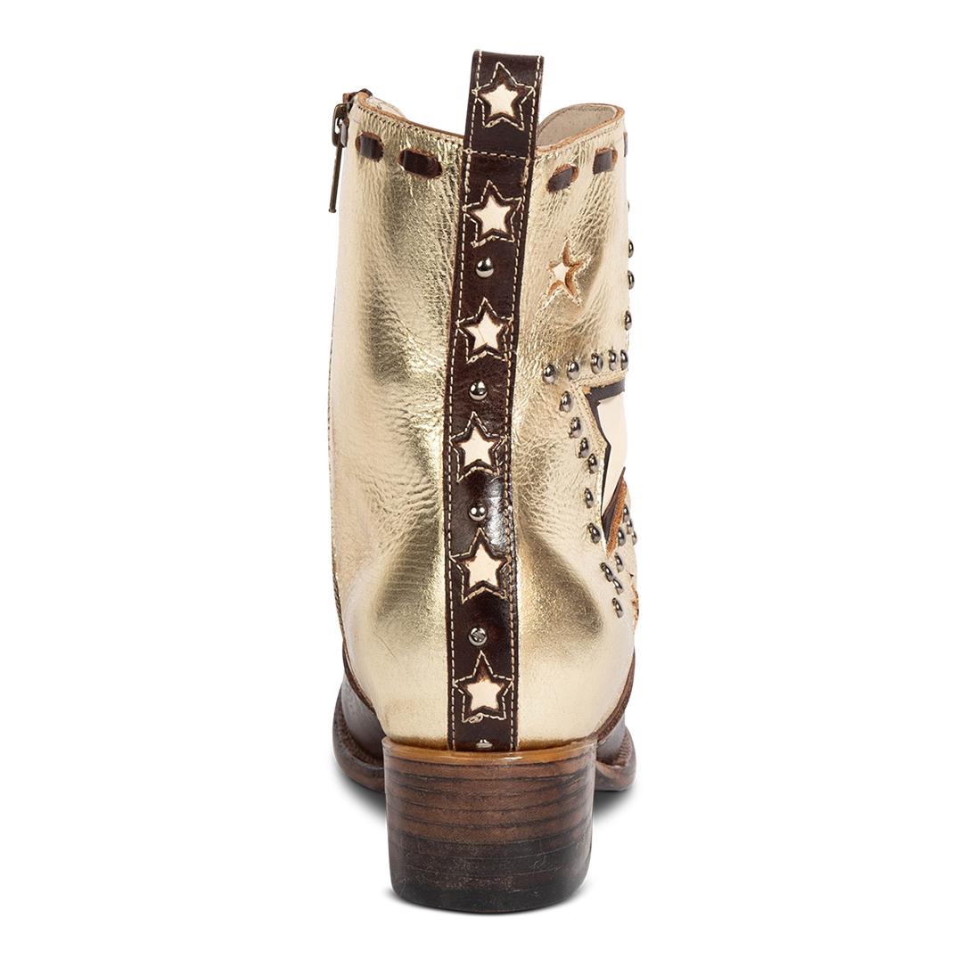 Back view showing leather heel counter detailing with star and stud accents on FREEBIRD women's Dolly gold/brown multi low heeled bootie
