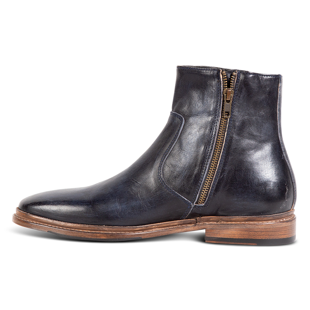 Inside view showing FREEBIRD men's Douglas navy leather ankle boot with an almond toe, inside zip and low heel