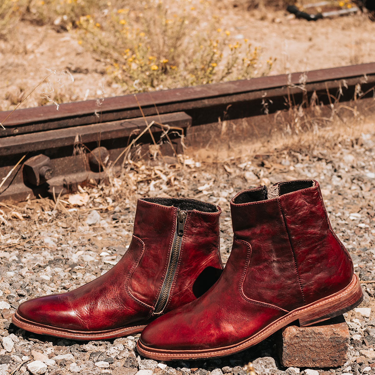 FREEBIRD men's Douglas wine leather ankle boot with an almond toe, inside zip and low heel