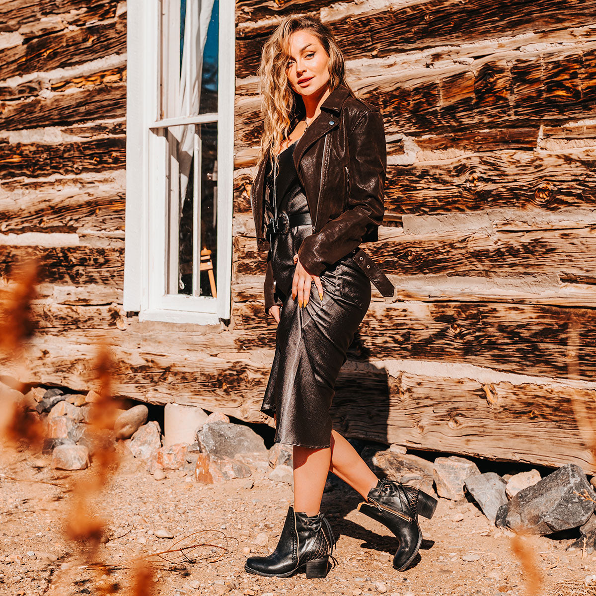 FREEBIRD women's Dreamer black leather bootie with laser cut detailing, leather tie back straps, a stacked heel and square toe lifestyle