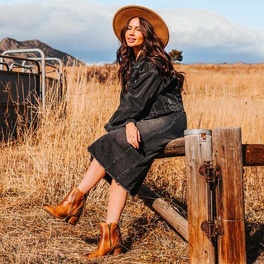 FREEBIRD women's Dreamer wheat leather bootie with laser cut detailing, leather tie back straps, a stacked heel and square toe lifestyle 