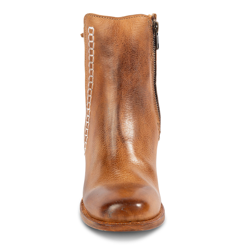 Front view showing FREEBIRD women's Dreamer wheat leather bootie with a square toe, inside working brass zipper and stitch detailing