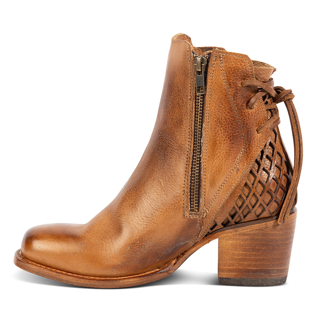 Inside view showing working brass zipper, laser cut detailing, and a stacked heel on FREEBIRD women's Dreamer wheat leather bootie