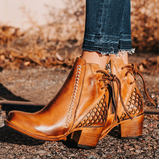 FREEBIRD women's Dreamer wheat leather bootie with laser cut detailing, leather tie back straps, a stacked heel and square toe lifestyle