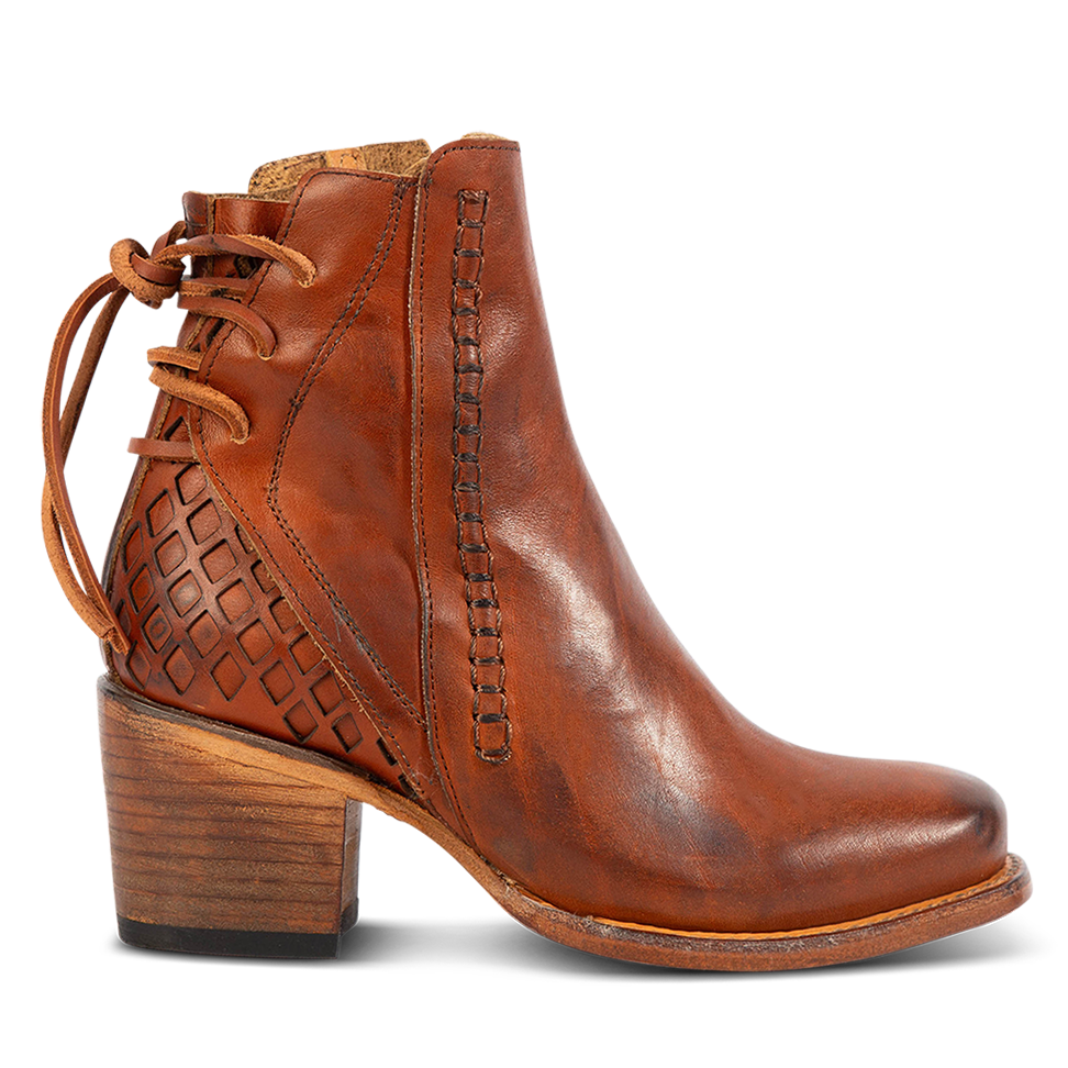 FREEBIRD women's Dreamer whiskey leather bootie with laser cut detailing, leather tie back straps, a stacked heel and square toe
