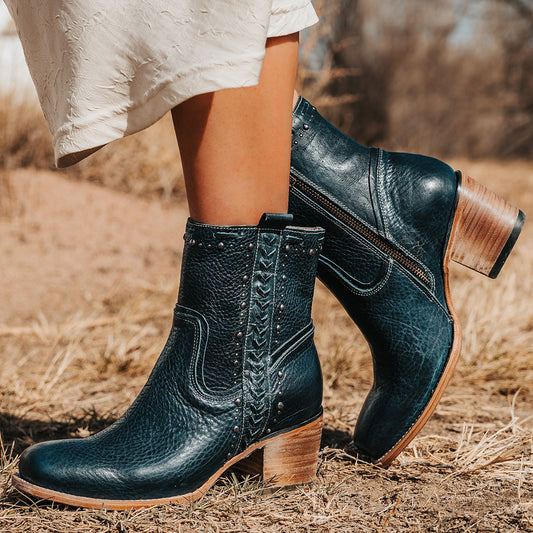 FREEBIRD Women's Duke blue leather bootie with stud and whip stitch detailing, a full working inside zipper and square toe construction