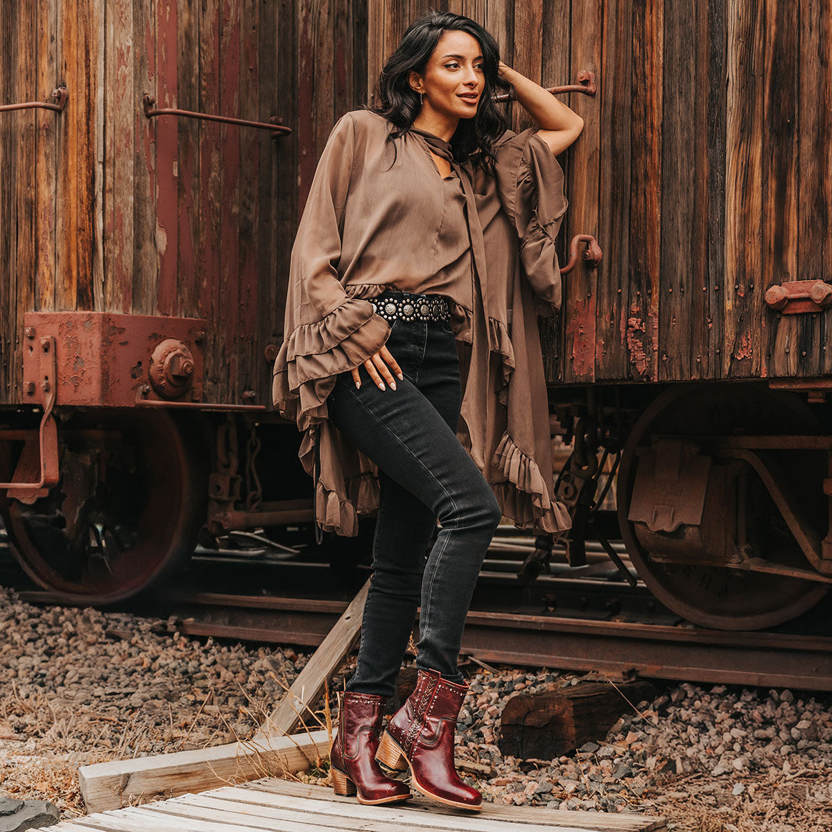 FREEBIRD Women's Duke red leather bootie with stud and whip stitch detailing, a full working inside zipper and square toe construction lifestyle