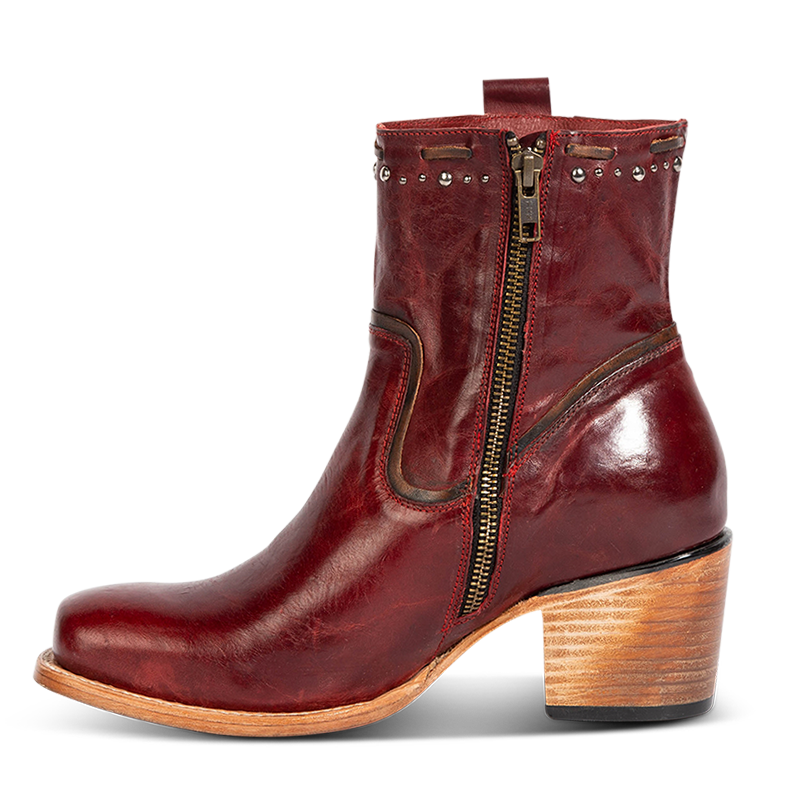 Inside view showing FREEBIRD Women's Duke red leather bootie with stud and whip stitch detailing, a full working inside zipper and square toe construction