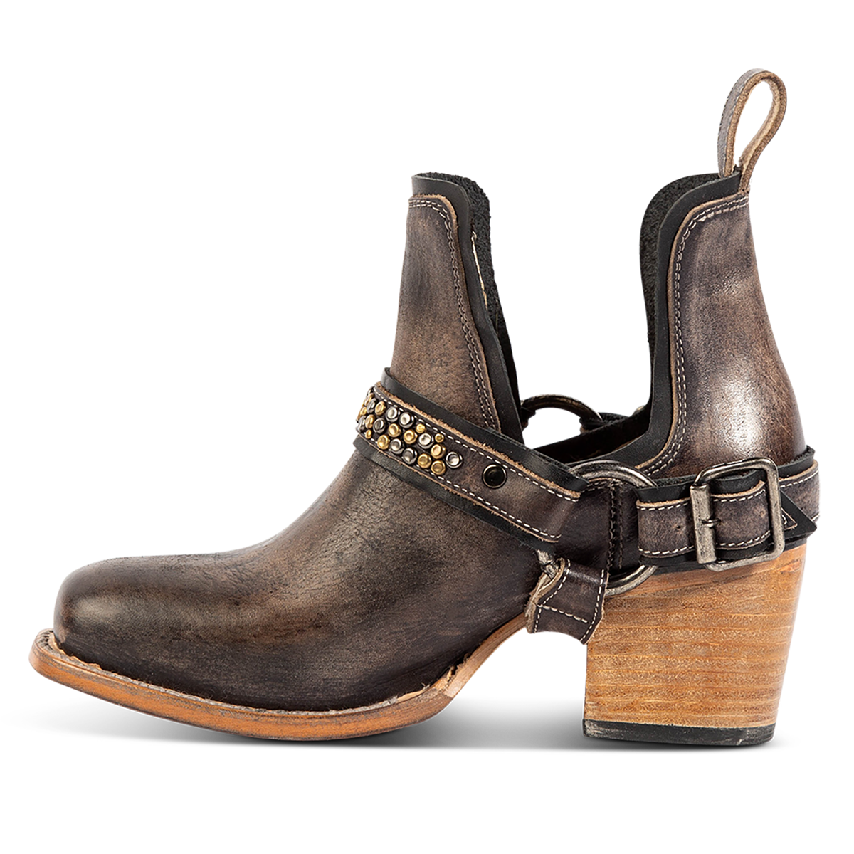Inside view showing FREEBIRD women's Dusty black distressed bootie with studded embellishments, an ankle harness and a slip on leather pull strap