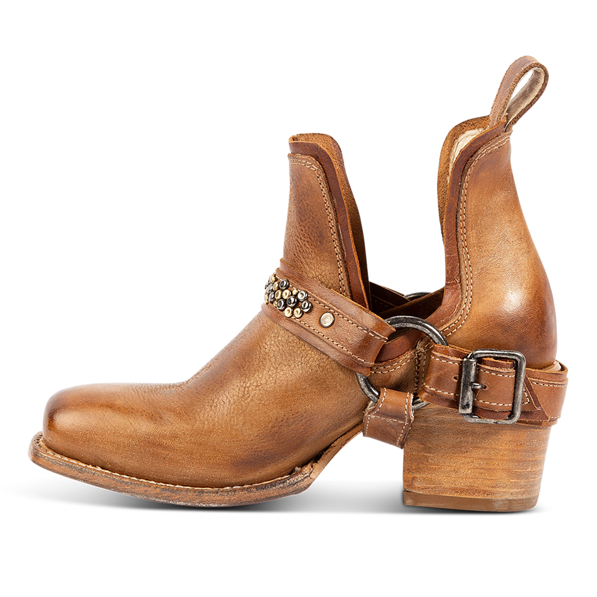 Inside view showing FREEBIRD women's Dusty wheat multi bootie with studded embellishments, an ankle harness and a slip on leather pull strap