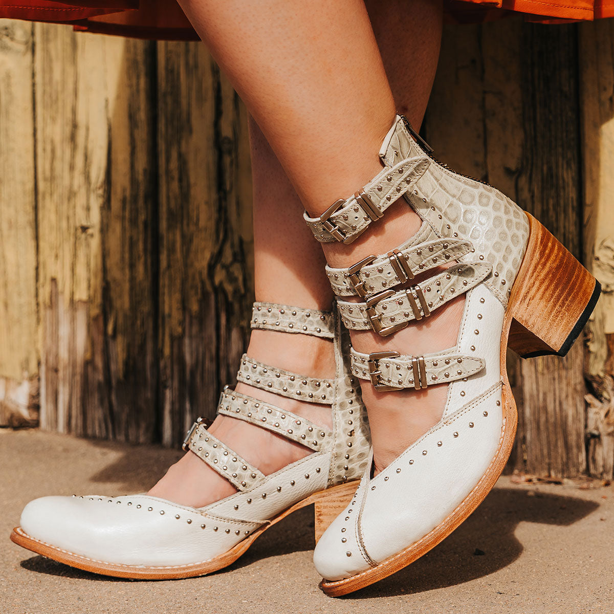 FREEBIRD women's Felicity white multi open construction adjustable strappy bootie with silver studded detailing and back zip closure