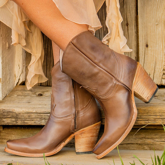 FREEBIRD women's Firebird beige premium leather bootie with an inverted lifted heel and inside working zipper