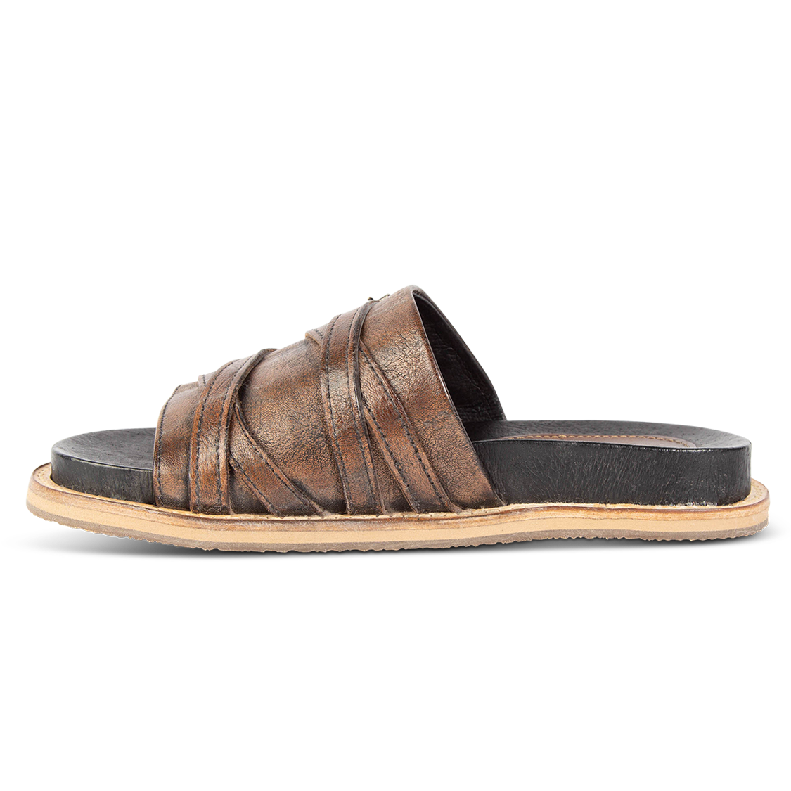Inside view showing FREEBIRD foot strap on women's Fleetwood black flat slip-on sandal