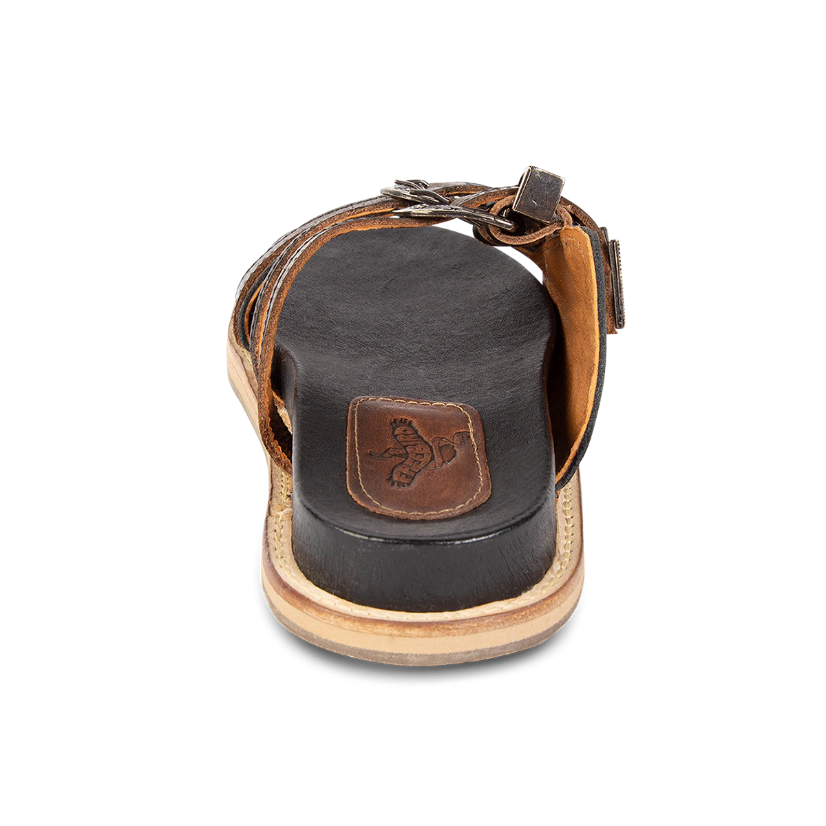 Back view showing flat heel on FREEBIRD women's Franki black slip-on flat shoe featuring engraved metal detailing