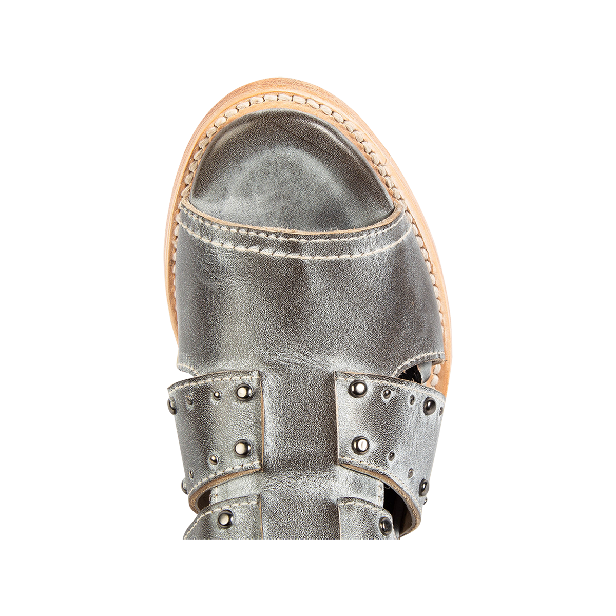 Top view showing a rounded toe and metal embellishments on FREEBIRD women's Ghost ice leather sandal