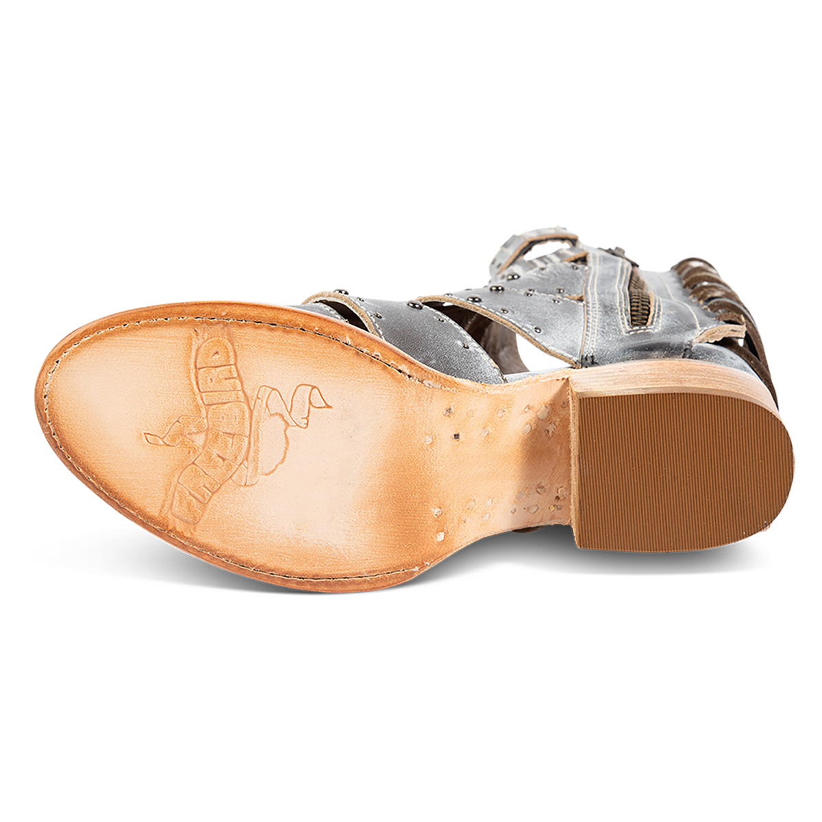 Leather sole imprinted with FREEBIRD on women's Ghost ice leather sandal