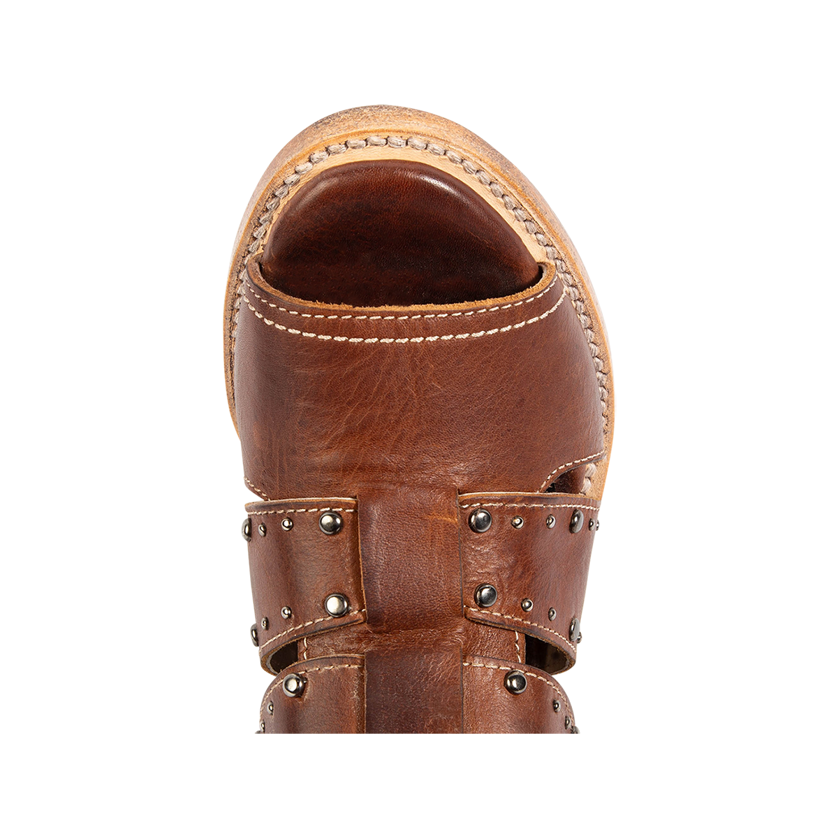 Top view showing a rounded toe and metal embellishments on FREEBIRD women's Ghost tan leather sandal