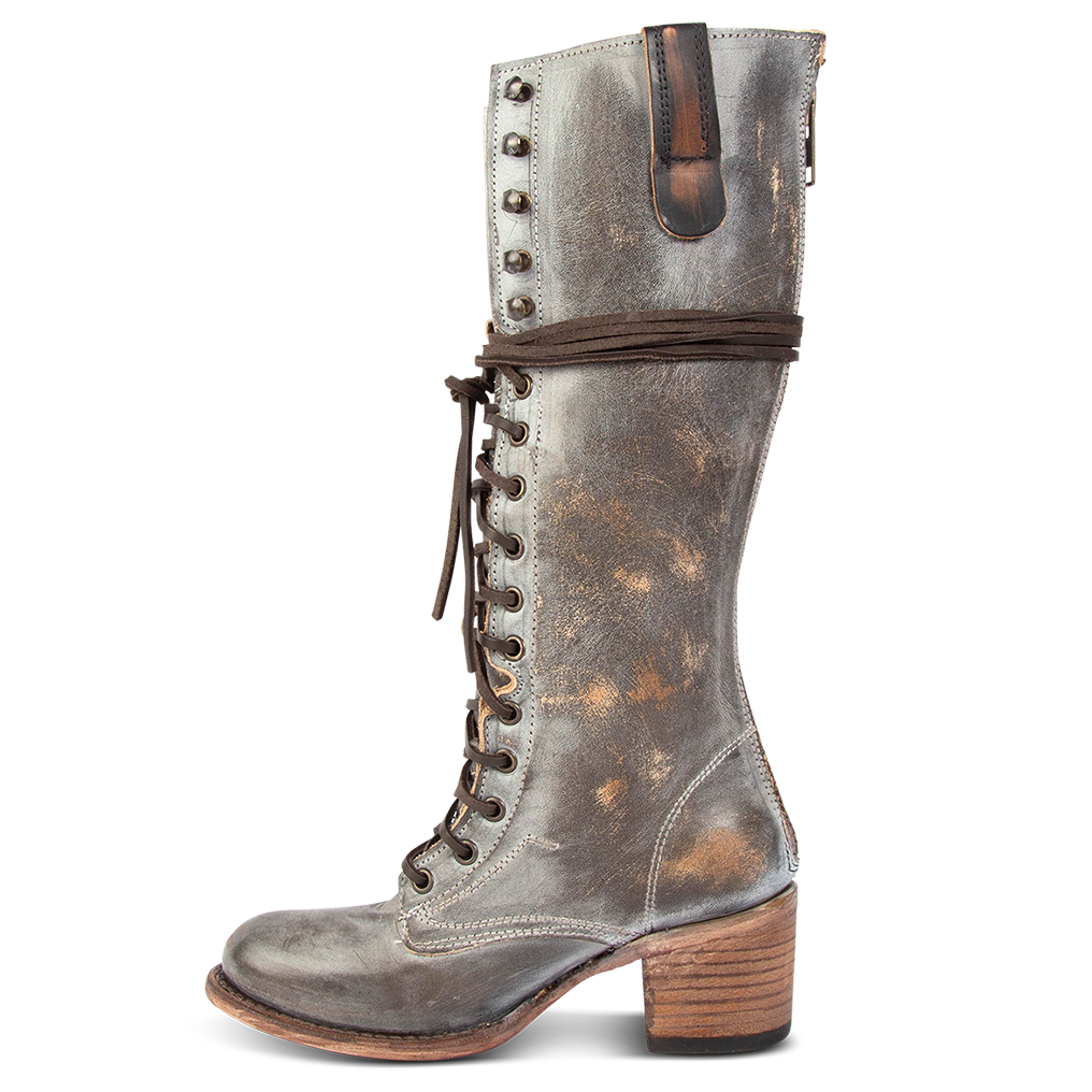 Inside view showing accent pull strap and wrap around leather laces on FREEBIRD women's Grany ice tall boot