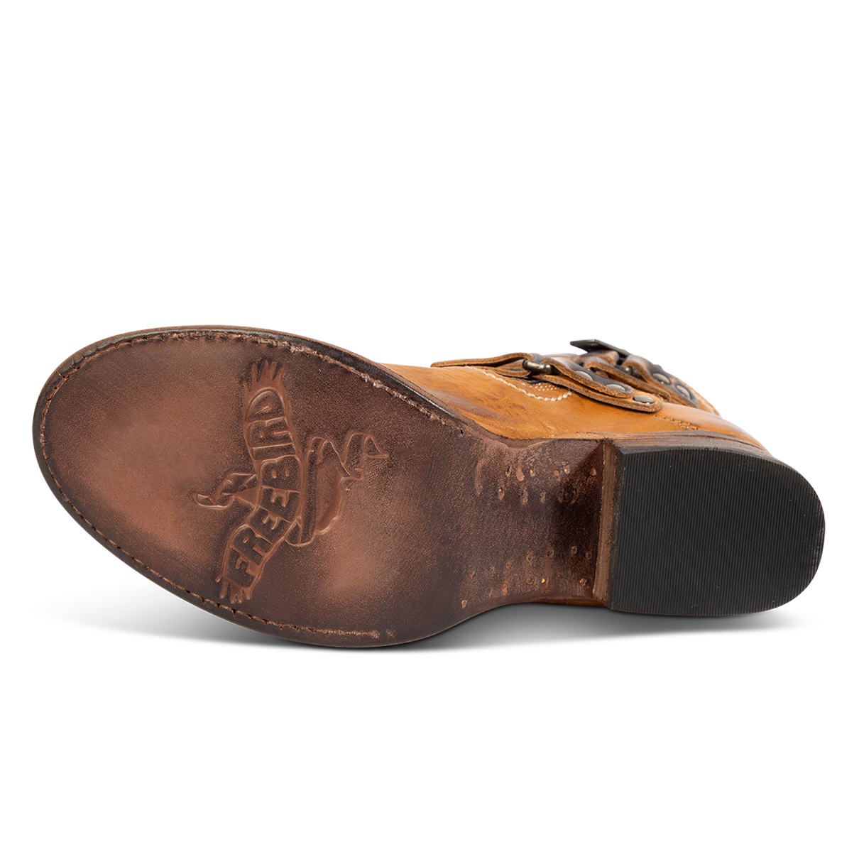 Leather sole imprinted with FREEBIRD on women's Grecko cognac leather ankle bootie