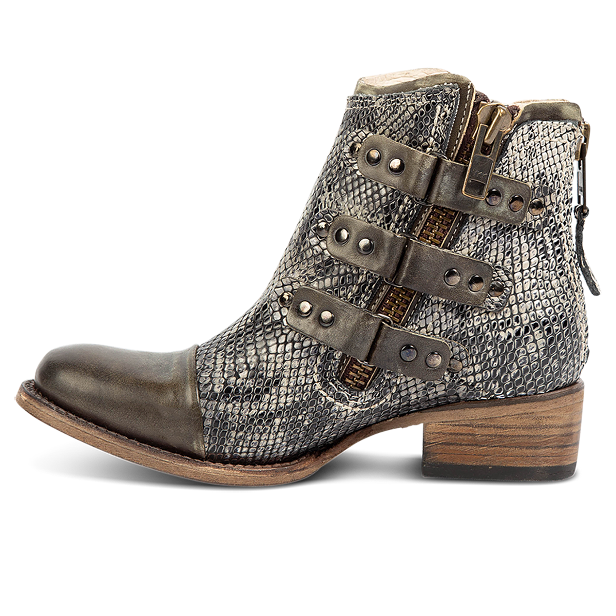 Inside view showing studded straps and low block heel on FREEBIRD women's Grecko olive leather ankle bootie