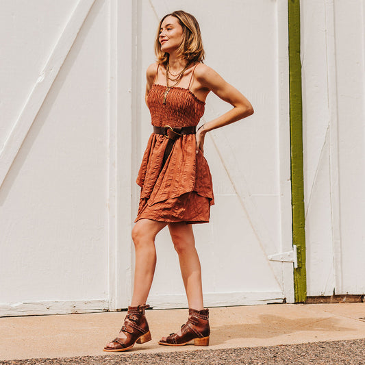 FREEBIRD women's Gunnar cognac leather sandal with adjustable leather straps, studded embellishments and a low block heel lifestyle
