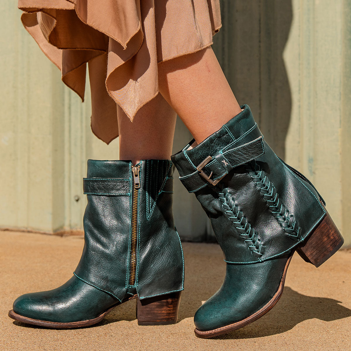 Freebird women's HAWK blue leather bootie with whip stitch detailing, leather shaft overlay and adjustable ankle buckle