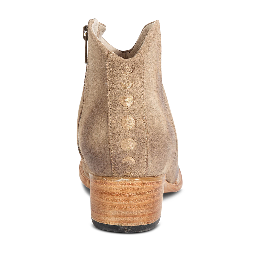 Back view showing low heel and embroidered back seam on FREEBIRD women's Hippy beige suede bootie