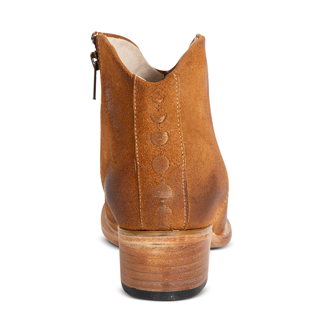Back view showing low heel and embroidered back seam on FREEBIRD women's Hippy cognac suede bootie