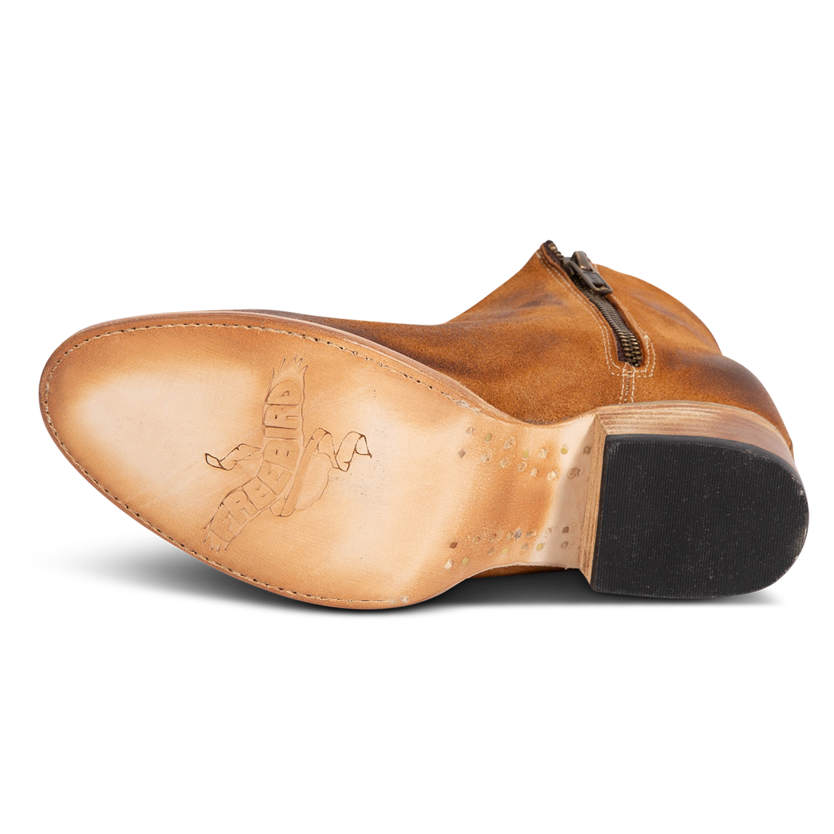 Leather sole imprinted with FREEBIRD on women's Hippy cognac suede bootie