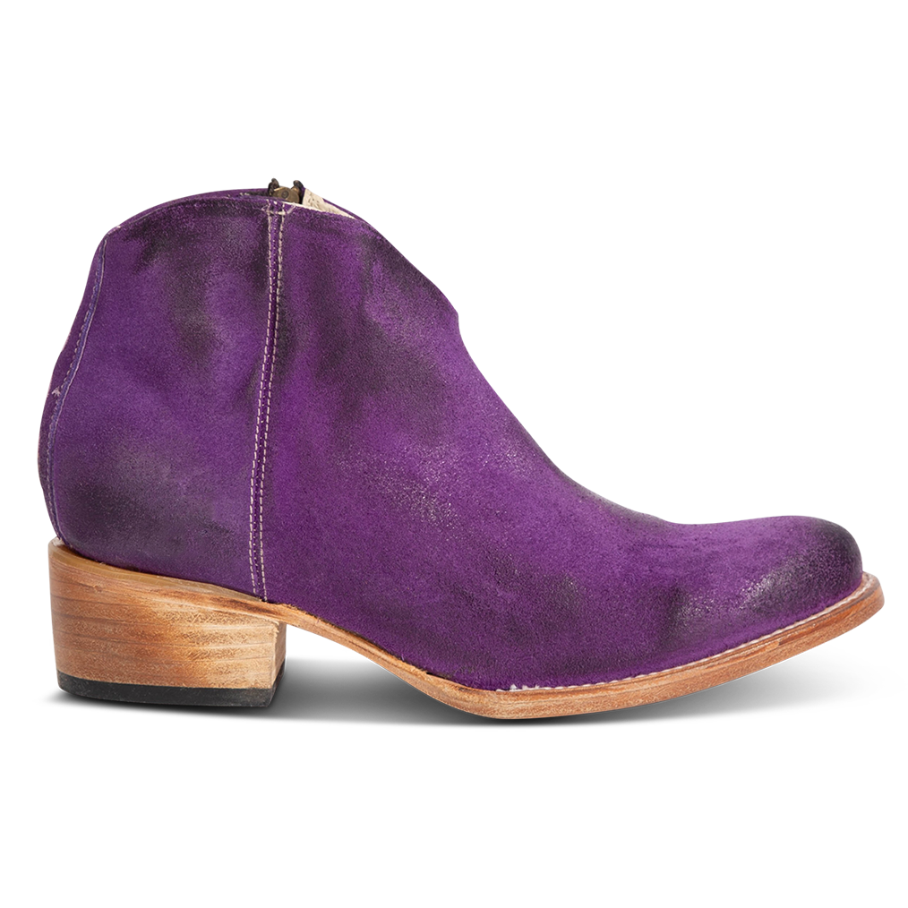 FREEBIRD women's Hippy purple suede low heeled bootie with a working brass zip closure, heel seam embroidery, almond toe, and front dip detailing