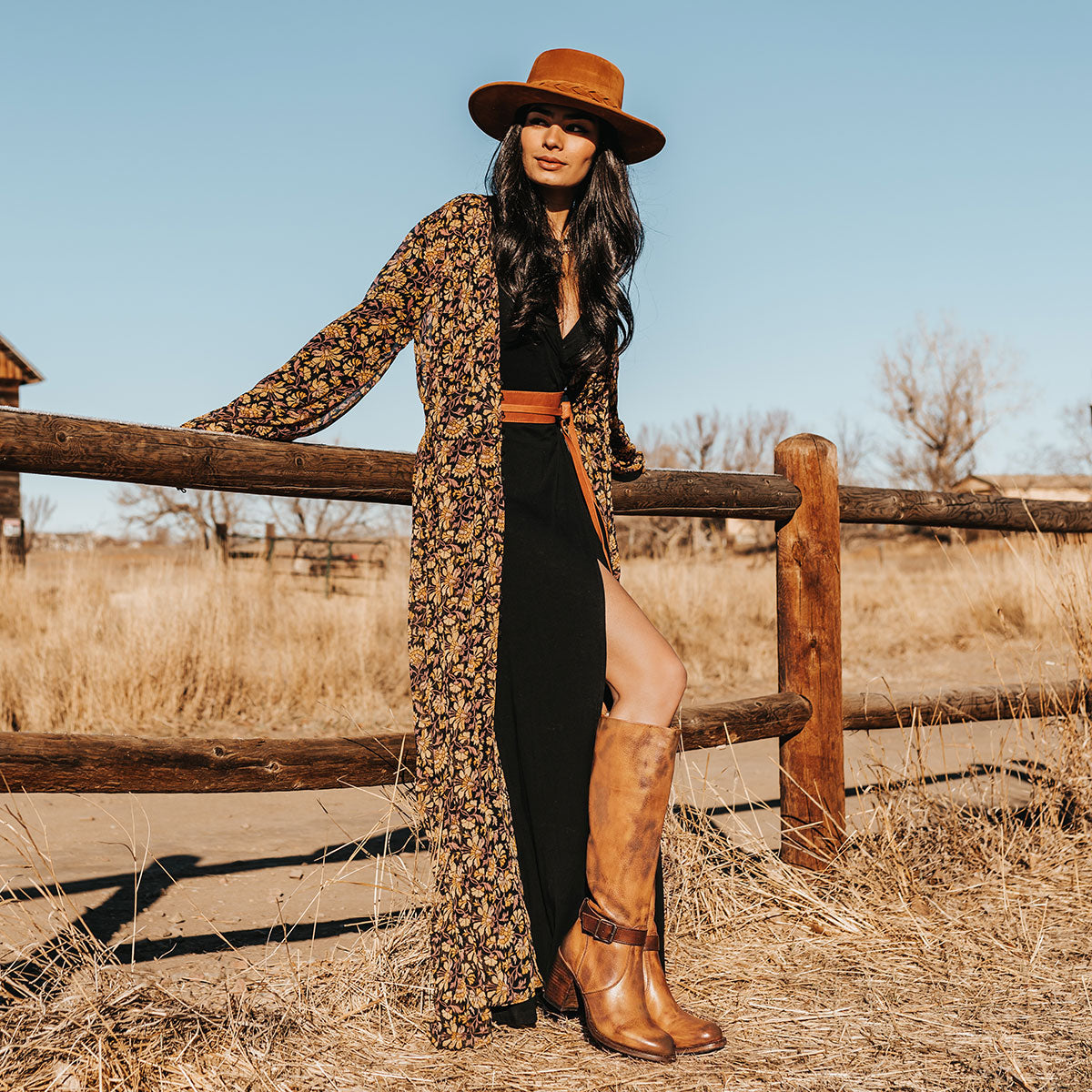 Freebird women's HOLLAND honey leather tall boot with a full inside brass zipper, in-step adjustable belt and bold high heel lifestyle