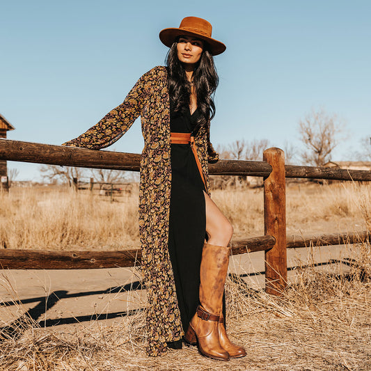 Freebird women's HOLLAND honey leather tall boot with a full inside brass zipper, in-step adjustable belt and bold high heel lifestyle