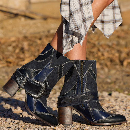 Freebird women's JAYMIE navy multi patchwork leather bootie with a removable buckle, lifted heel and pointed toe silhouette