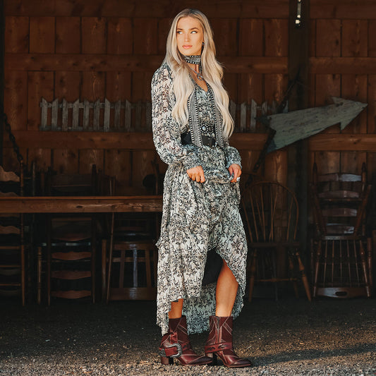 Freebird women's JAYMIE wine multi patchwork leather bootie with a removable buckle, lifted heel and pointed toe silhouette lifestyle