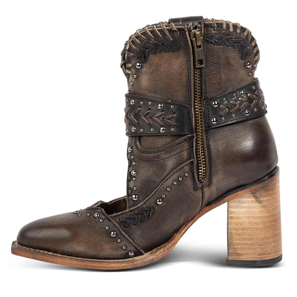 Inside view showing working brass zip closure, western detailing and a wood stacked heel on FREEBIRD women's Jetson black bootie